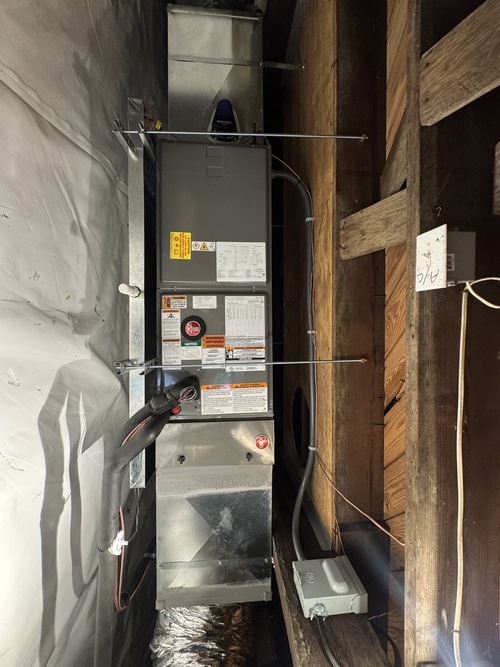 air handler and furnace unit in an attic space