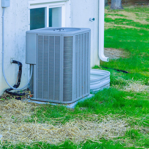 view of an outdoor air conditioner compressor
